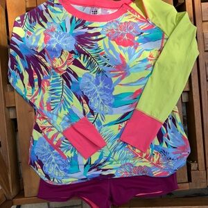 Title nine sunbuster top with added shorties to make a set